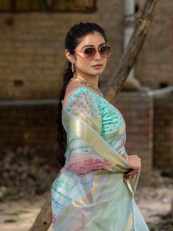 Off Blue Vibrant Organza Silk Saree with Mesmerizing Digital Print and Zari Border