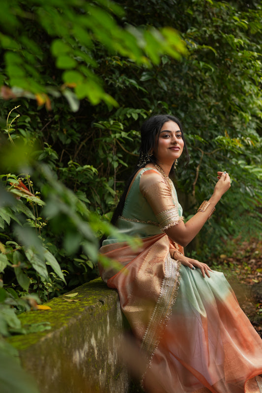 Dual Shade Sea Green Orange Maharani Tissue Silk Saree