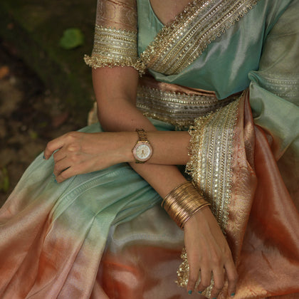 Dual Shade Sea Green Orange Maharani Tissue Silk Saree