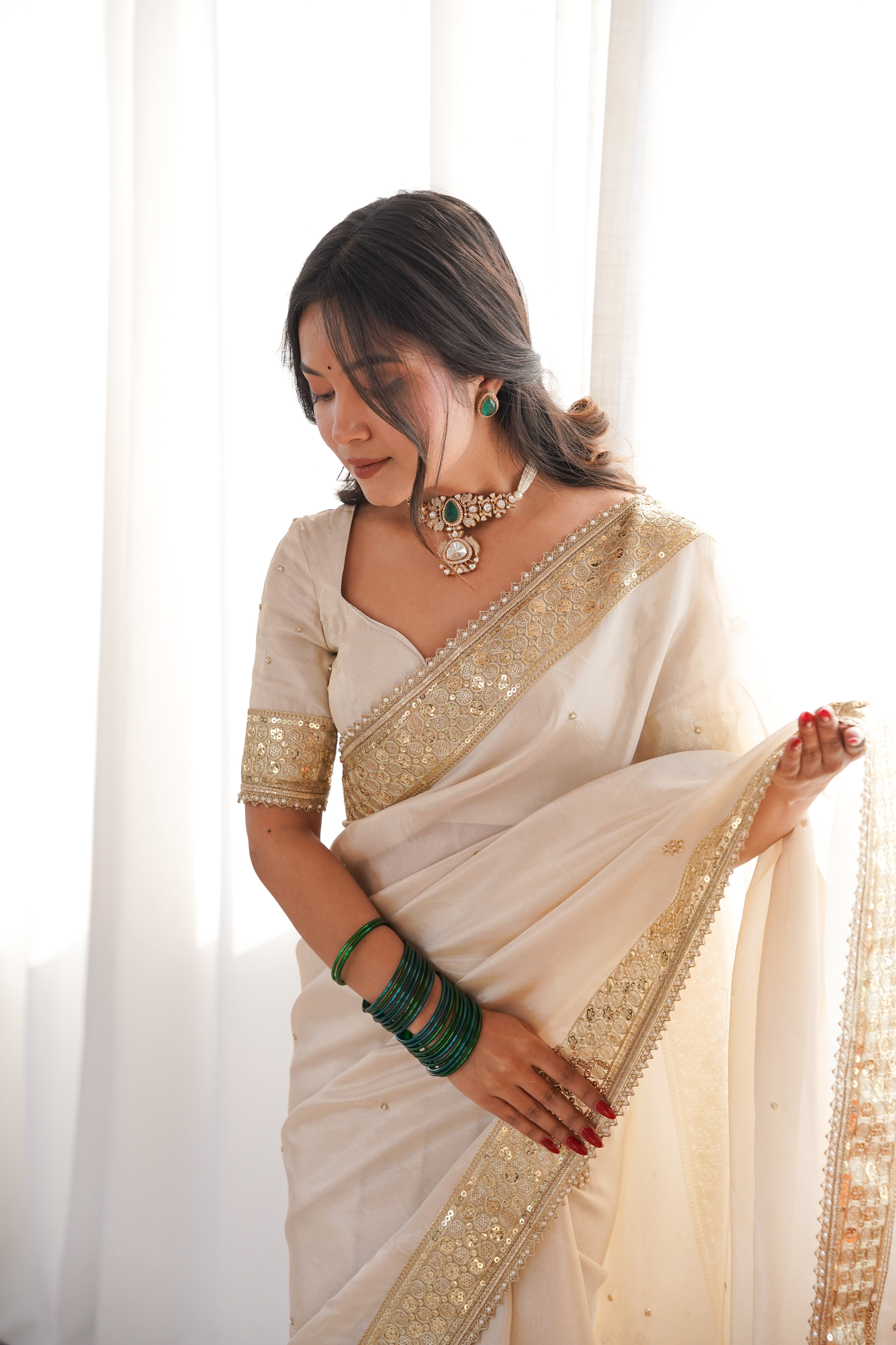Rang-e-Mehar Pearl Ivory Handcrafted Zardozi Soft Tissue Silk Saree