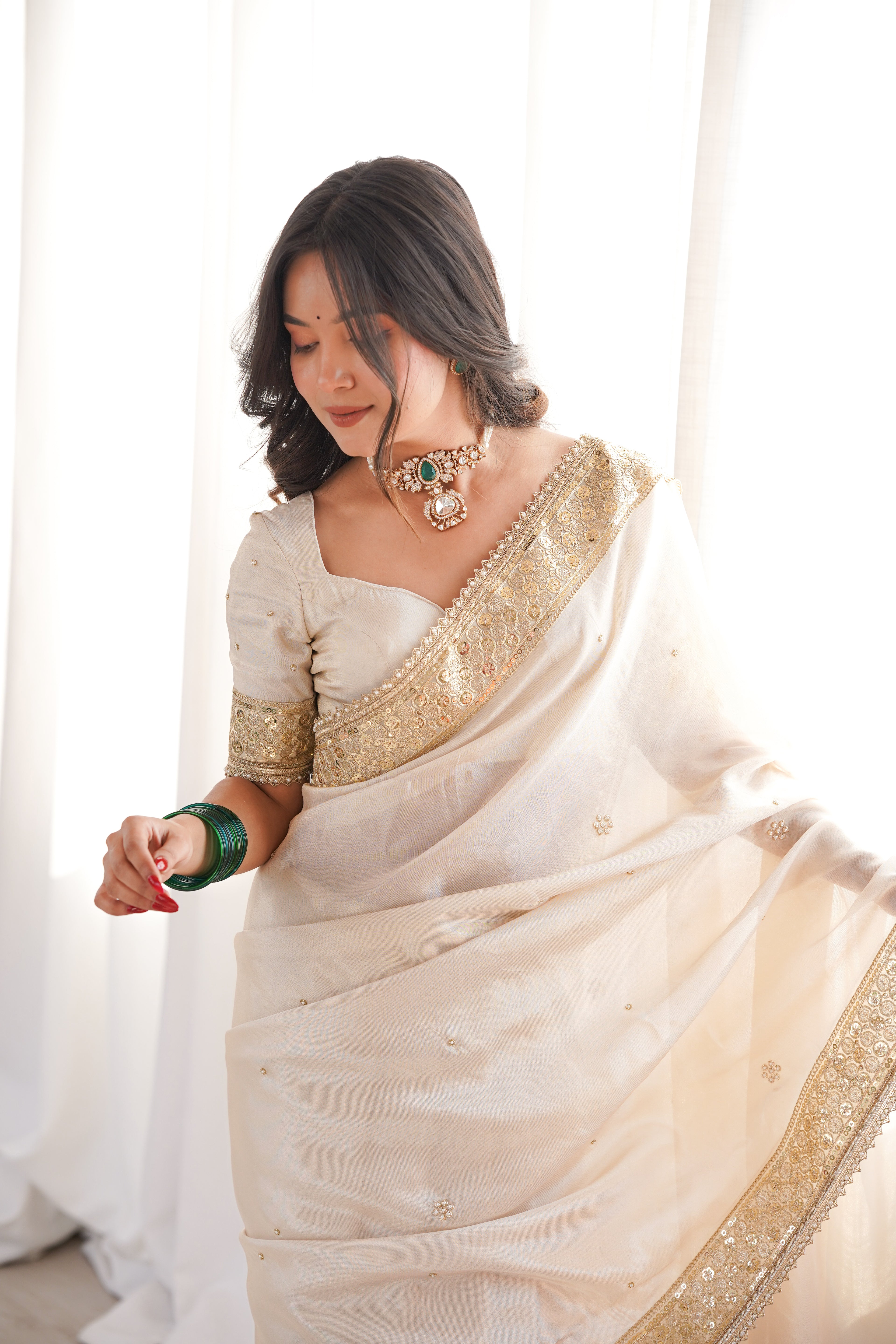 Rang-e-Mehar Pearl Ivory Handcrafted Zardozi Soft Tissue Silk Saree