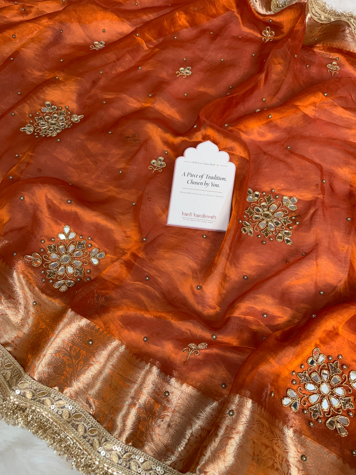 Metallic Orange Pure Tissue Silk Handcrafted Saree