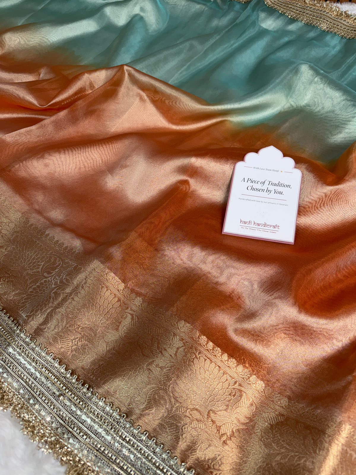 Dual Shade Sea Green Orange Maharani Tissue Silk Saree