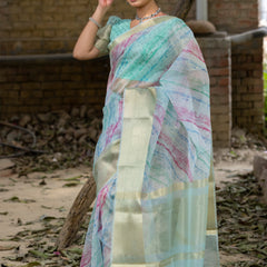Off Blue Vibrant Organza Silk Saree with Mesmerizing Digital Print and Zari Border