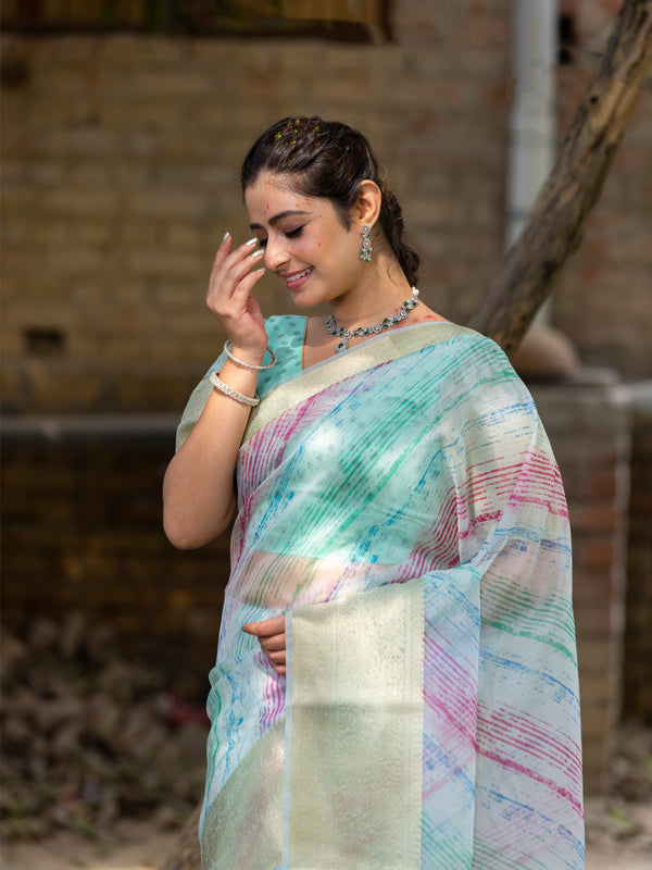 Off Blue Vibrant Organza Silk Saree with Mesmerizing Digital Print and Zari Border