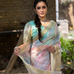 Off White Vibrant Organza Silk Saree with Mesmerizing Digital Print and Zari Border