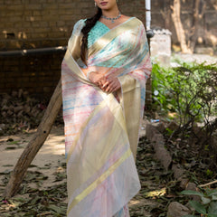 Off White Vibrant Organza Silk Saree with Mesmerizing Digital Print and Zari Border