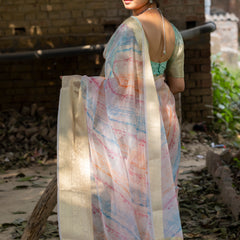 Off White Vibrant Organza Silk Saree with Mesmerizing Digital Print and Zari Border