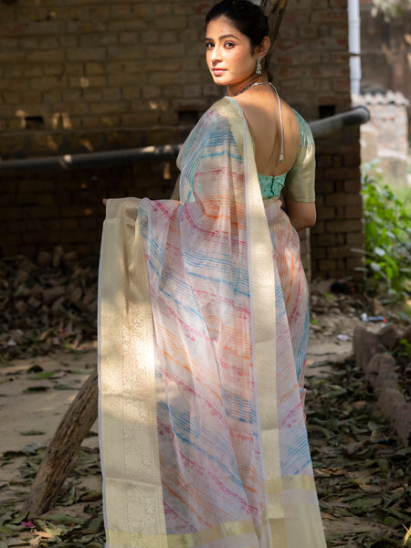 Off White Vibrant Organza Silk Saree with Mesmerizing Digital Print and Zari Border
