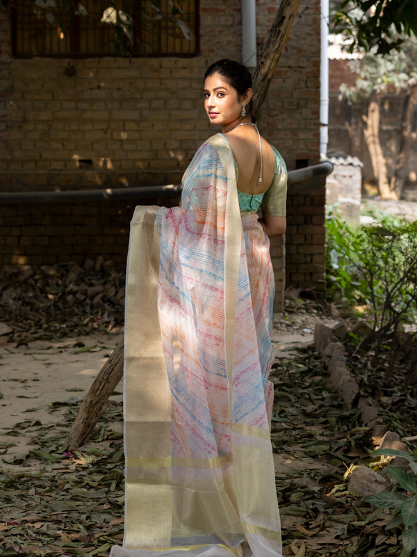 Off White Vibrant Organza Silk Saree with Mesmerizing Digital Print and Zari Border